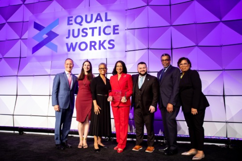 2022 Scales of Justice Honoree Teresa Wynn Roseborough on the event stage with event participants (L-R) Mark Wasserman, Alexandra Zaretsky, Verna Williams, Joey Carrillo, Billy Martin, and Michel Martin