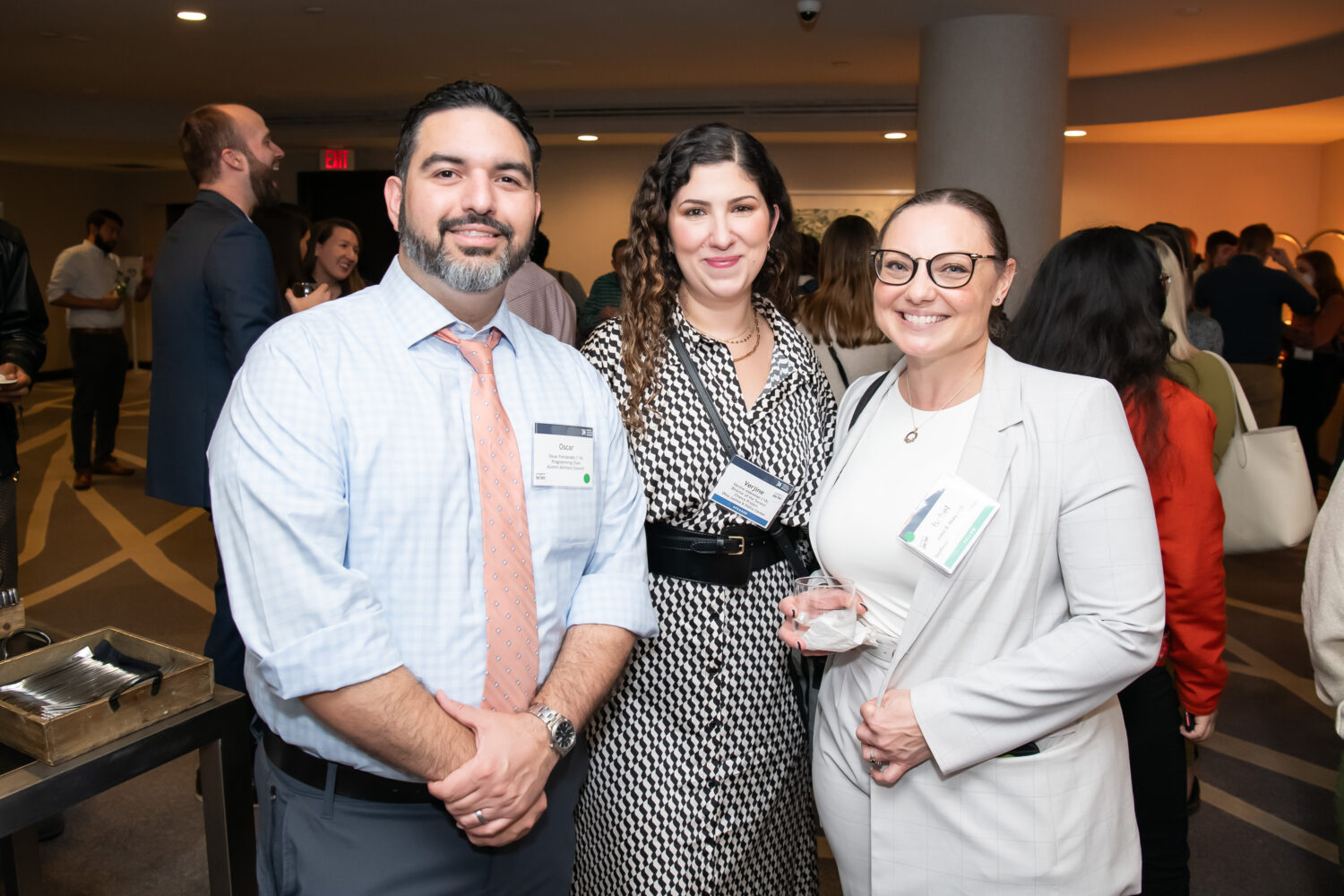 Picture of Oscar Fernandez, programming committee chair for the Alumni Advisory Council at Equal Justice Works; Verjine Adanalian, member of the AAC, and 2023 Fellow Isobel Healy at the Alumni-Fellow Welcome Reception at Leadership Development Training 2023