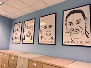 Portraits of Andrew Cook, Troy Davis, Warren Hill, and Marcus Wellons at the GRC offices